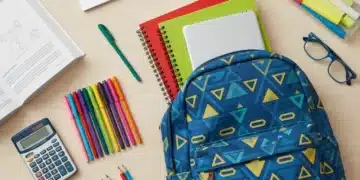 Organized back-to-school supplies display with notebooks, pens, backpack, and calculator, ready for savings in 2026